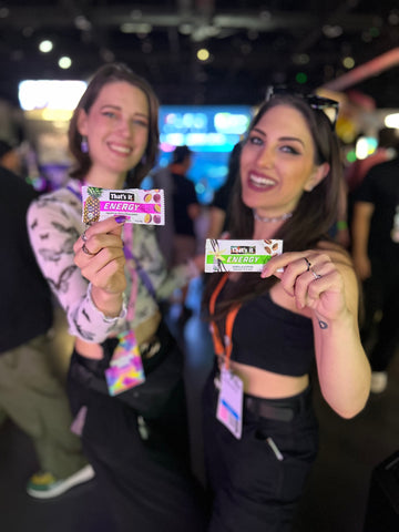 TwitchCon 2024 attendees holding That's it. Energy Bars